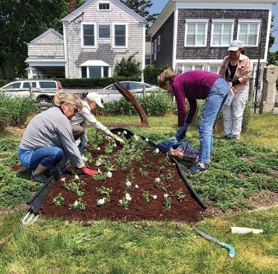 Mattapoisett Woman’s Club Garden Group
Red, white, and blue was Sharon Doyon’s vision of the Mattapoisett Woman’s Club Garden Group as 18 members gathered at the library to plant on May 26 in areas including the pots at the Mattapoisett Historical Society and Town Hall, window boxes at the post office and Town Beach house, the lighthouse garden at the harbor, plus the gardens and planters at the Mattapoisett Free Public Library. 
