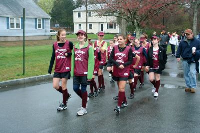 Opening Day
The Mattapoisett Youth Baseball League opened their 2009 season with a parade down Route Six on Saturday morning, May 2. Special guest and Boston Red Sox mascot Wally the Green Monster was on hand to throw out the first pitch and sign autographs for the young players. Photo by Robert Chiarito.
