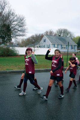 Opening Day
The Mattapoisett Youth Baseball League opened their 2009 season with a parade down Route Six on Saturday morning, May 2. Special guest and Boston Red Sox mascot Wally the Green Monster was on hand to throw out the first pitch and sign autographs for the young players. Photo by Robert Chiarito.
