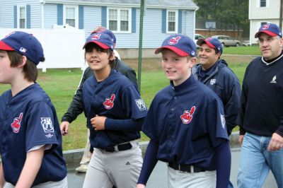 Opening Day
The Mattapoisett Youth Baseball League opened their 2009 season with a parade down Route Six on Saturday morning, May 2. Special guest and Boston Red Sox mascot Wally the Green Monster was on hand to throw out the first pitch and sign autographs for the young players. Photo by Robert Chiarito.
