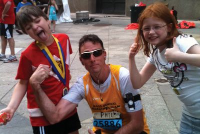 Marathon Man
Rochester resident Phil Cordeiro, middle, is preparing for his second Boston Marathon which will be held in April 2013.  He will run once again on behalf of the team from Massachusetts General Hospital and all funds raised will benefit children and families dealing with cancer.  Photo courtesy of Phil Cordeiro. 
