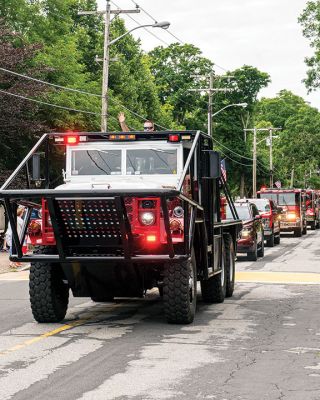 Marion 4th of July Parade
Marion Town Administrator Jay McGrail and Select Board members Norm Hills, John Waterman, and Randy Parker walked the Independence Day parade route on Monday morning along with veterans, marching bands, Boy and Girl Scout troops, youth baseball teams, decorated floats, fire engines, and a convoy of antique cars. Beginning at the Town House, the parade route went up Spring Street, then east on Route 6 before going right onto Front Street all the way down to Main Street and back up to Spring. Photos by Ryan F
