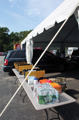 The Marion Board of Health and the Council on Aging worked together to hold a flu vaccination clinic on September 28 outside the Cushing Community Center. Approximately 150 people preregistered for the drive-through clinic that was supported by UMass Dartmouth nursing students. Photos by Mick Colageo
