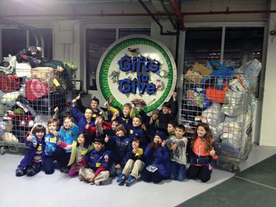 Ton of Donations
On Monday, December 8th Marion Cub Scout Pack 32, held a very successful drive for Gifts to Give Charity.  The boys collected literally a “ton” of donations, approximately 2,000 pounds of toys, clothing and household goods!  Gifts to Give provides a place for anyone, including children to give back to their local community, by donating gently used items and repurposing them for children in need.

