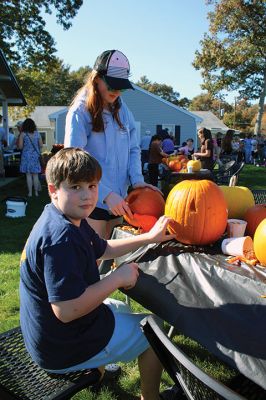 Pumpkin Palooza
Marion’s annual Pumpkin Palooza held Saturday at the Cushing Community Center brought out kids who had fun carving up pumpkins and enjoying music with DJ Dave. Donuts and popcorn were served by volunteers from the Council on Aging, and Sparky was among the many representatives of the Marion Fire Department. Photos by Mick Colageo
