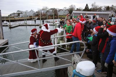 Marion Village Christmas Stroll
Despite eventual rain, the Marion Village Christmas Stroll was enjoyed by many on Sunday afternoon. The event included musical entertainment by Tri-County musicians, Grades 4 and 5 bands from Sippican Elementary School, Sippican Historical Society carolers and Tabor Academy students, horse-drawn carriage rides, street entertainment, seasonal refreshments courtesy of area merchants, goodie bags from VASE, and crafts for kids. Photos by Mick Colageo
