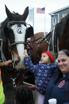 Marion Village Christmas Stroll
Despite eventual rain, the Marion Village Christmas Stroll was enjoyed by many on Sunday afternoon. The event included musical entertainment by Tri-County musicians, Grades 4 and 5 bands from Sippican Elementary School, Sippican Historical Society carolers and Tabor Academy students, horse-drawn carriage rides, street entertainment, seasonal refreshments courtesy of area merchants, goodie bags from VASE, and crafts for kids. Photos by Mick Colageo
