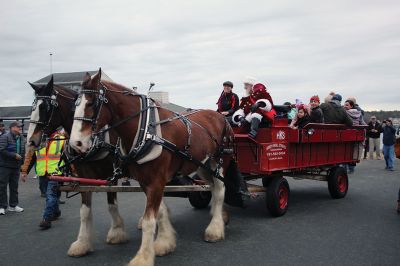 Marion Village Christmas Stroll
Despite eventual rain, the Marion Village Christmas Stroll was enjoyed by many on Sunday afternoon. The event included musical entertainment by Tri-County musicians, Grades 4 and 5 bands from Sippican Elementary School, Sippican Historical Society carolers and Tabor Academy students, horse-drawn carriage rides, street entertainment, seasonal refreshments courtesy of area merchants, goodie bags from VASE, and crafts for kids. Photos by Mick Colageo
