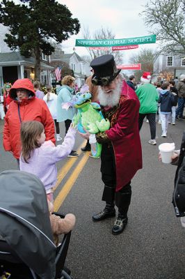 Marion Village Christmas Stroll
Despite eventual rain, the Marion Village Christmas Stroll was enjoyed by many on Sunday afternoon. The event included musical entertainment by Tri-County musicians, Grades 4 and 5 bands from Sippican Elementary School, Sippican Historical Society carolers and Tabor Academy students, horse-drawn carriage rides, street entertainment, seasonal refreshments courtesy of area merchants, goodie bags from VASE, and crafts for kids. Photos by Mick Colageo
