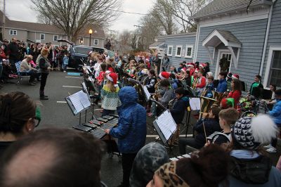 Marion Village Christmas Stroll
Despite eventual rain, the Marion Village Christmas Stroll was enjoyed by many on Sunday afternoon. The event included musical entertainment by Tri-County musicians, Grades 4 and 5 bands from Sippican Elementary School, Sippican Historical Society carolers and Tabor Academy students, horse-drawn carriage rides, street entertainment, seasonal refreshments courtesy of area merchants, goodie bags from VASE, and crafts for kids. Photos by Mick Colageo
