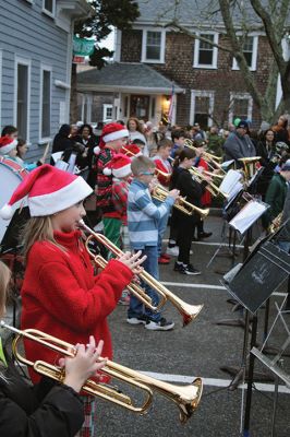 Marion Village Christmas Stroll
Despite eventual rain, the Marion Village Christmas Stroll was enjoyed by many on Sunday afternoon. The event included musical entertainment by Tri-County musicians, Grades 4 and 5 bands from Sippican Elementary School, Sippican Historical Society carolers and Tabor Academy students, horse-drawn carriage rides, street entertainment, seasonal refreshments courtesy of area merchants, goodie bags from VASE, and crafts for kids. Photos by Mick Colageo
