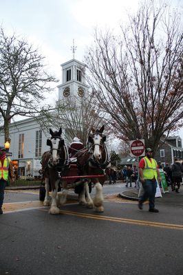 Marion Village Christmas Stroll
Despite eventual rain, the Marion Village Christmas Stroll was enjoyed by many on Sunday afternoon. The event included musical entertainment by Tri-County musicians, Grades 4 and 5 bands from Sippican Elementary School, Sippican Historical Society carolers and Tabor Academy students, horse-drawn carriage rides, street entertainment, seasonal refreshments courtesy of area merchants, goodie bags from VASE, and crafts for kids. Photos by Mick Colageo
