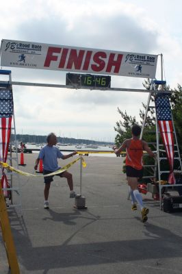 Marion 5K
Approximately 448 runners participated in the 14th Annual Marion Village 5K on June 26, 2010. The community race raised approximately $6,000 for the Marion Recreational Committee that maintains playground equipment, baseball fields and otherwise enhances the recreational opportunities in Marion. 22-year old Brendan Medeiros of Fall River finished in first place with a time of 16:47. Photo by Laura Pedulli.

