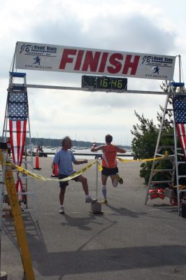 Marion 5K
Approximately 448 runners participated in the 14th Annual Marion Village 5K on June 26, 2010. The community race raised approximately $6,000 for the Marion Recreational Committee that maintains playground equipment, baseball fields and otherwise enhances the recreational opportunities in Marion. 22-year old Brendan Medeiros of Fall River finished in first place with a time of 16:47. Photo by Laura Pedulli.
