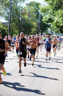 Marion Village 5K
The number of participants in this year’s Marion Village 5K might have been down slightly according to race organizers, but the sentiment of fun and competition certainly was not on Saturday, June 25. Taking first place for men was Andrew Sukeforth of Middleboro with a time of 15:43, and Meg Hughes of Rochester won first place in the women’s division with a time of 19:50. The annual 5K race that winds its way through scenic Marion village is now in its 20th year. Photos by Colin Veitch
