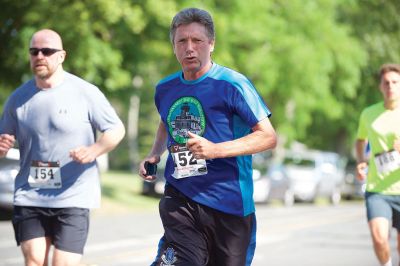 Marion Village 5K
The number of participants in this year’s Marion Village 5K might have been down slightly according to race organizers, but the sentiment of fun and competition certainly was not on Saturday, June 25. Taking first place for men was Andrew Sukeforth of Middleboro with a time of 15:43, and Meg Hughes of Rochester won first place in the women’s division with a time of 19:50. The annual 5K race that winds its way through scenic Marion village is now in its 20th year. Photos by Colin Veitch
