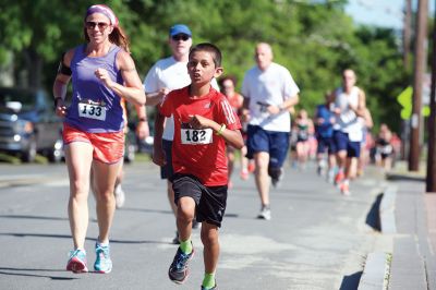 Marion Village 5K
The number of participants in this year’s Marion Village 5K might have been down slightly according to race organizers, but the sentiment of fun and competition certainly was not on Saturday, June 25. Taking first place for men was Andrew Sukeforth of Middleboro with a time of 15:43, and Meg Hughes of Rochester won first place in the women’s division with a time of 19:50. The annual 5K race that winds its way through scenic Marion village is now in its 20th year. Photos by Colin Veitch
