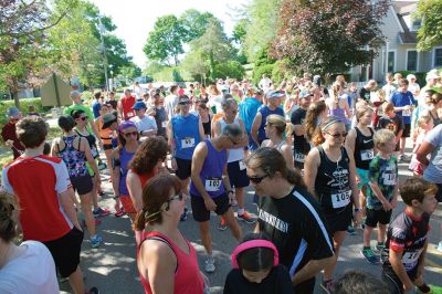 Marion Village 5K
The number of participants in this year’s Marion Village 5K might have been down slightly according to race organizers, but the sentiment of fun and competition certainly was not on Saturday, June 25. Taking first place for men was Andrew Sukeforth of Middleboro with a time of 15:43, and Meg Hughes of Rochester won first place in the women’s division with a time of 19:50. The annual 5K race that winds its way through scenic Marion village is now in its 20th year. Photos by Colin Veitch
