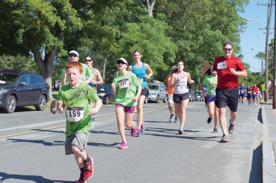 Marion Village 5K
The number of participants in this year’s Marion Village 5K might have been down slightly according to race organizers, but the sentiment of fun and competition certainly was not on Saturday, June 25. Taking first place for men was Andrew Sukeforth of Middleboro with a time of 15:43, and Meg Hughes of Rochester won first place in the women’s division with a time of 19:50. The annual 5K race that winds its way through scenic Marion village is now in its 20th year. Photos by Colin Veitch
