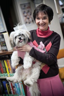 Sammi
Elizabeth Taber Library Director Judie Kleven poses with the librarys official dog, Sammi, during the canines birthday festivities at the library in early December, 2010. Photo by Corinna Raznikov.
