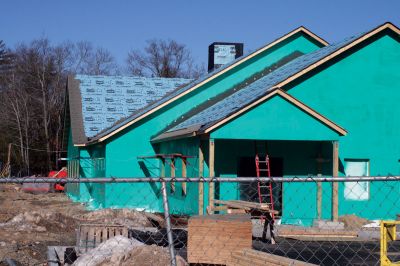 Not Easy Being Green
As of February 4, 2010, the new police department in Marion is making good progress. Town Administrator Paul Dawson received calls from concerned citizens about the bright green exterior, but assures the public that this is just the vapor shield and not the final color. Photo by Anne OBrien-Kakley.
