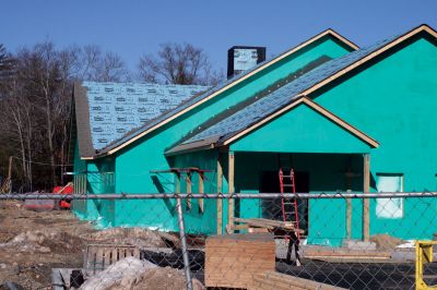 Not Easy Being Green
As of February 4, 2010, the new police department in Marion is making good progress. Town Administrator Paul Dawson received calls from concerned citizens about the bright green exterior, but assures the public that this is just the vapor shield and not the final color. Photo by Anne OBrien-Kakley.
