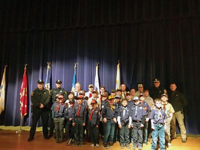 Scouts Food Drive
The Marion Police Department and Marion Cub Scouts Pack 32 joined forces once again for the annual "Scouting for Food" food drive. The group collected hundreds of pounds of non-perishable food items for a local food pantry and delivered it at the end of the Veterans Day ceremony. Photo courtesy Marion Cub Scouts
