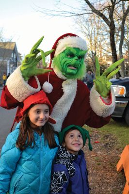 Marion Village Stroll
There were hundreds strolling the streets during the 2014 Marion Holiday Stroll on December 14. Celebrity sightings included Santa Claus on his carriage, the Grinch, the Nutcracker, and Sparky the Fire Dog. The Showstoppers and The Sippican School Marching Band lit up the afternoon until the tree lighting ceremony lit up the night, the finale of that starry-skied evening. Photos by Felix Perez and Jean Perry 
