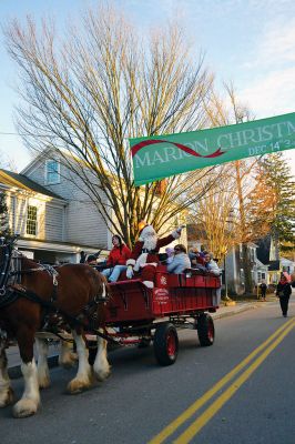 Marion Village Stroll
There were hundreds strolling the streets during the 2014 Marion Holiday Stroll on December 14. Celebrity sightings included Santa Claus on his carriage, the Grinch, the Nutcracker, and Sparky the Fire Dog. The Showstoppers and The Sippican School Marching Band lit up the afternoon until the tree lighting ceremony lit up the night, the finale of that starry-skied evening. Photos by Felix Perez and Jean Perry 
