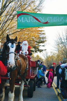 Marion Village Stroll
There were hundreds strolling the streets during the 2014 Marion Holiday Stroll on December 14. Celebrity sightings included Santa Claus on his carriage, the Grinch, the Nutcracker, and Sparky the Fire Dog. The Showstoppers and The Sippican School Marching Band lit up the afternoon until the tree lighting ceremony lit up the night, the finale of that starry-skied evening. Photos by Felix Perez and Jean Perry 
