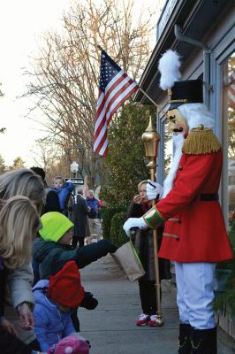 Marion Village Stroll
There were hundreds strolling the streets during the 2014 Marion Holiday Stroll on December 14. Celebrity sightings included Santa Claus on his carriage, the Grinch, the Nutcracker, and Sparky the Fire Dog. The Showstoppers and The Sippican School Marching Band lit up the afternoon until the tree lighting ceremony lit up the night, the finale of that starry-skied evening. Photos by Felix Perez and Jean Perry 
