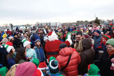 Marion Christmas Stroll
Sunday, December 11, was the annual Marion Christmas Stroll when Santa greets the crowd at Town Wharf before mounting his horse-drawn carriage for a ride through Marion village.
