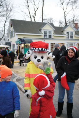 Marion Christmas Stroll
Sunday, December 11, was the annual Marion Christmas Stroll when Santa greets the crowd at Town Wharf before mounting his horse-drawn carriage for a ride through Marion village.
