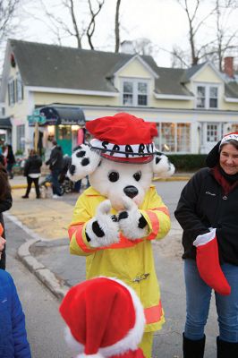 Marion Christmas Stroll
Sunday, December 11, was the annual Marion Christmas Stroll when Santa greets the crowd at Town Wharf before mounting his horse-drawn carriage for a ride through Marion village.
