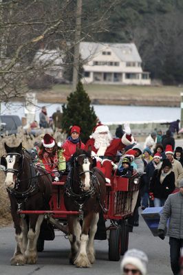 Marion Holiday Stroll
The Marion village streets were filled with holiday revelers on Sunday, December 9, for the annual Marion Holiday Stroll. Santa’s boat docked at the Marion Wharf where the faces of hundreds of children lit up at his arrival. Santa boarded a horse-drawn carriage and paraded through the streets, passing businesses offering free goodies and dodging the whereabouts of that old Grinch who didn’t seem to mind Christmas coming at all this year. Photos by Jean Perry
