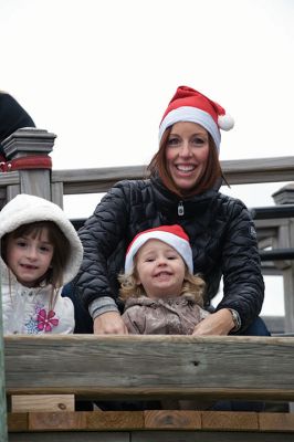 Marion Christmas Stroll 
The Marion Christmas Stroll is one of the quintessential holiday events in Tri-Town, with Santa making his grand entrance via boat and hopping aboard a horse-drawn carriage to ride through Marion village with some lucky kids who hop aboard with him. There were several Christmas celebrity sightings, and lots of music and entertainment into the evening. Photos by Colin Veitch
