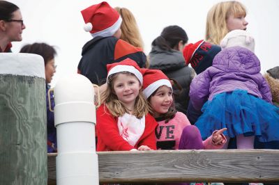 Marion Christmas Stroll 
The Marion Christmas Stroll is one of the quintessential holiday events in Tri-Town, with Santa making his grand entrance via boat and hopping aboard a horse-drawn carriage to ride through Marion village with some lucky kids who hop aboard with him. There were several Christmas celebrity sightings, and lots of music and entertainment into the evening. Photos by Colin Veitch
