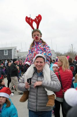 Marion Christmas Stroll 
The Marion Christmas Stroll is one of the quintessential holiday events in Tri-Town, with Santa making his grand entrance via boat and hopping aboard a horse-drawn carriage to ride through Marion village with some lucky kids who hop aboard with him. There were several Christmas celebrity sightings, and lots of music and entertainment into the evening. Photos by Colin Veitch
