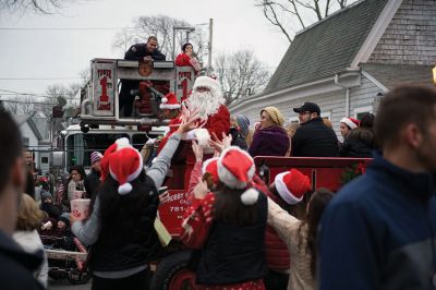 Marion Christmas Stroll 
The Marion Christmas Stroll is one of the quintessential holiday events in Tri-Town, with Santa making his grand entrance via boat and hopping aboard a horse-drawn carriage to ride through Marion village with some lucky kids who hop aboard with him. There were several Christmas celebrity sightings, and lots of music and entertainment into the evening. Photos by Colin Veitch
