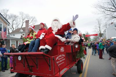 Marion Christmas Stroll 
The Marion Christmas Stroll is one of the quintessential holiday events in Tri-Town, with Santa making his grand entrance via boat and hopping aboard a horse-drawn carriage to ride through Marion village with some lucky kids who hop aboard with him. There were several Christmas celebrity sightings, and lots of music and entertainment into the evening. Photos by Colin Veitch
