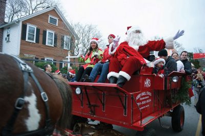 Marion Christmas Stroll 
The Marion Christmas Stroll is one of the quintessential holiday events in Tri-Town, with Santa making his grand entrance via boat and hopping aboard a horse-drawn carriage to ride through Marion village with some lucky kids who hop aboard with him. There were several Christmas celebrity sightings, and lots of music and entertainment into the evening. Photos by Colin Veitch
