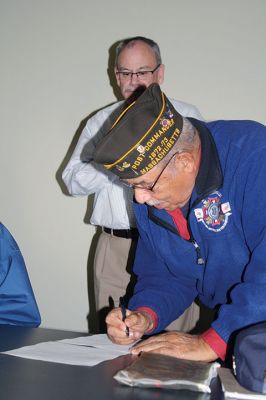 Benjamin D. Cushing VFW Post 2425
Members of the Benjamin D. Cushing VFW Post 2425 were present on Wednesday, December 7, for the signing over of the 465 Mill Street VFW building, marking the official transfer of the building to the Town. Selectmen thanked the gentlemen for their years of service within the town before Post Commander Demi Barros and Rodney Hunt signed the deed. Photo by Jean Perry
