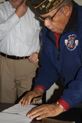 Benjamin D. Cushing VFW Post 2425
Members of the Benjamin D. Cushing VFW Post 2425 were present on Wednesday, December 7, for the signing over of the 465 Mill Street VFW building, marking the official transfer of the building to the Town. Selectmen thanked the gentlemen for their years of service within the town before Post Commander Demi Barros and Rodney Hunt signed the deed. Photo by Jean Perry
