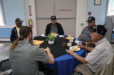 Marion Veterans
Marion veterans participated in the Council on Aging's "Vet Together" luncheon on Monday at the Cushing Community Center where they met retired Naval officer Chris Gerrior, the Tri-Town’s new veterans services officer. Pictured at the table enjoying lunch with Gerrior are, from left: Rocky Lopes, U.S. Army; A.J. Porche, U.S. Navy; Demi Barros, U.S. Navy; and Gabe Ditata, U.S. Army. Photos by Mick Colageo

