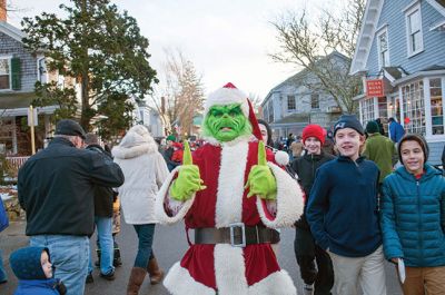 Marion Village Stroll 
The Marion Village Stroll on Sunday includes a visit from Santa who arrived by boat and then was transported by wagon to meet the children. Photo by Felix Perez
