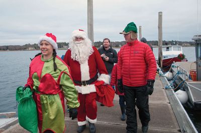 Marion Village Stroll 
The Marion Village Stroll on Sunday includes a visit from Santa who arrived by boat and then was transported by wagon to meet the children. Photo by Felix Perez
