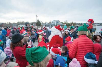 Marion Village Stroll 
The Marion Village Stroll on Sunday includes a visit from Santa who arrived by boat and then was transported by wagon to meet the children. Photo by Felix Perez
