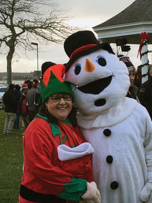 Holiday in the Park
The December 10 Holiday in the Park event found the Town of Mattapoisett awash in families having fun. Food and music added to the festive atmosphere, and the presence of Mr. and Mrs. Claus (Mr. and Mrs. Milton Heuberger), Frosty the Snowman (Brian Hiller), one of Santa's reindeer (Ashling McLoughlin) and one of the big guy's most trusted Elves (Jen Scott) brought smiles and picture opportunities. At 5:00 pm, the Christmas tree decorated by Center School students was illuminated. Photos by Marilou Newell
