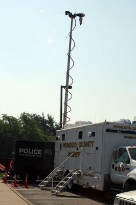 PD Flooding
All Mattapoisett police station services, including communication and 911 services, are being facilitated with the help of the Plymouth County Sheriff Office's mobile response unit. The police station operated out of their parking lot on the Memorial Day weekend of 2010 due to a burst water pipe on the second floor of the station, which caused significant damage to the building. Photo by Anne O'Brien-Kakley.
