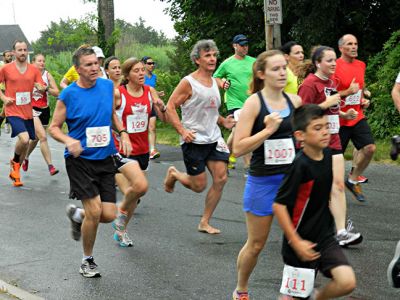 Mattapoisett Road Race
The 44th running of the Mattapoisett Road Race, July 4, 2014. Photo by Renae Reints
